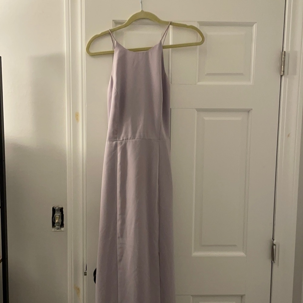 Floor length spaghetti strap bridesmaid dress with slit.